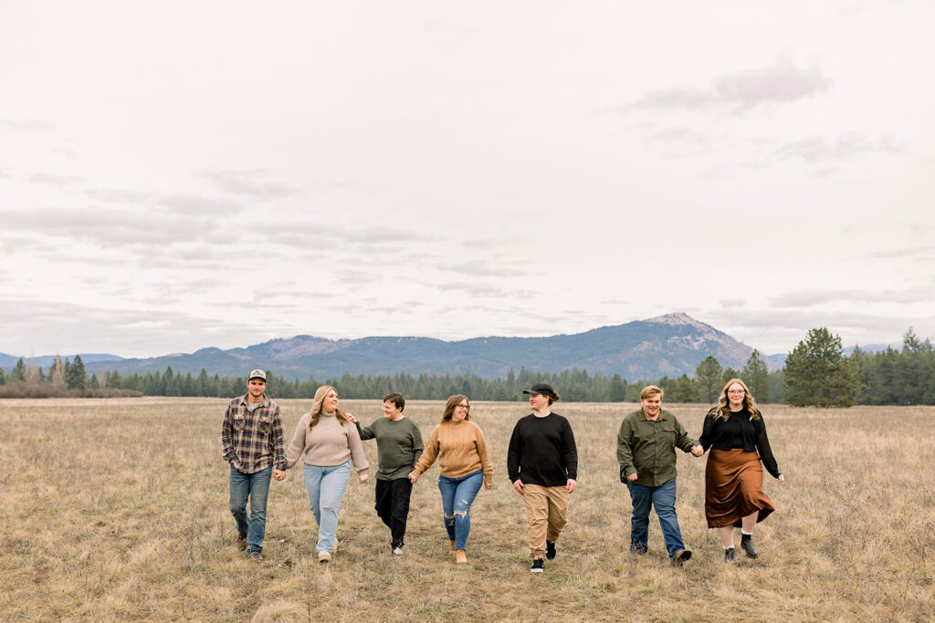 Family wearing layered fall outfits during a Northern Idaho family photo session